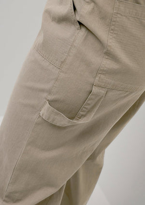 Beige cotton parachute style pants with carpenter style details Manitoba Canada