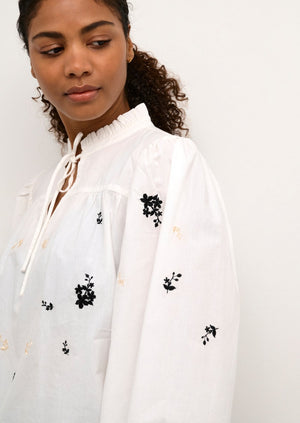 
            
                Load image into Gallery viewer, Kaffe lilly white floral embroidered cotton billowy statement blouse Manitoba Canada 
            
        
