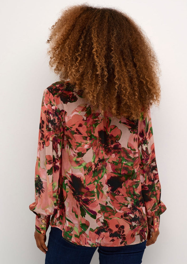 Bright bold long sleeved floral print drapey feminine workwear blouse by Cream Manitoba Canada