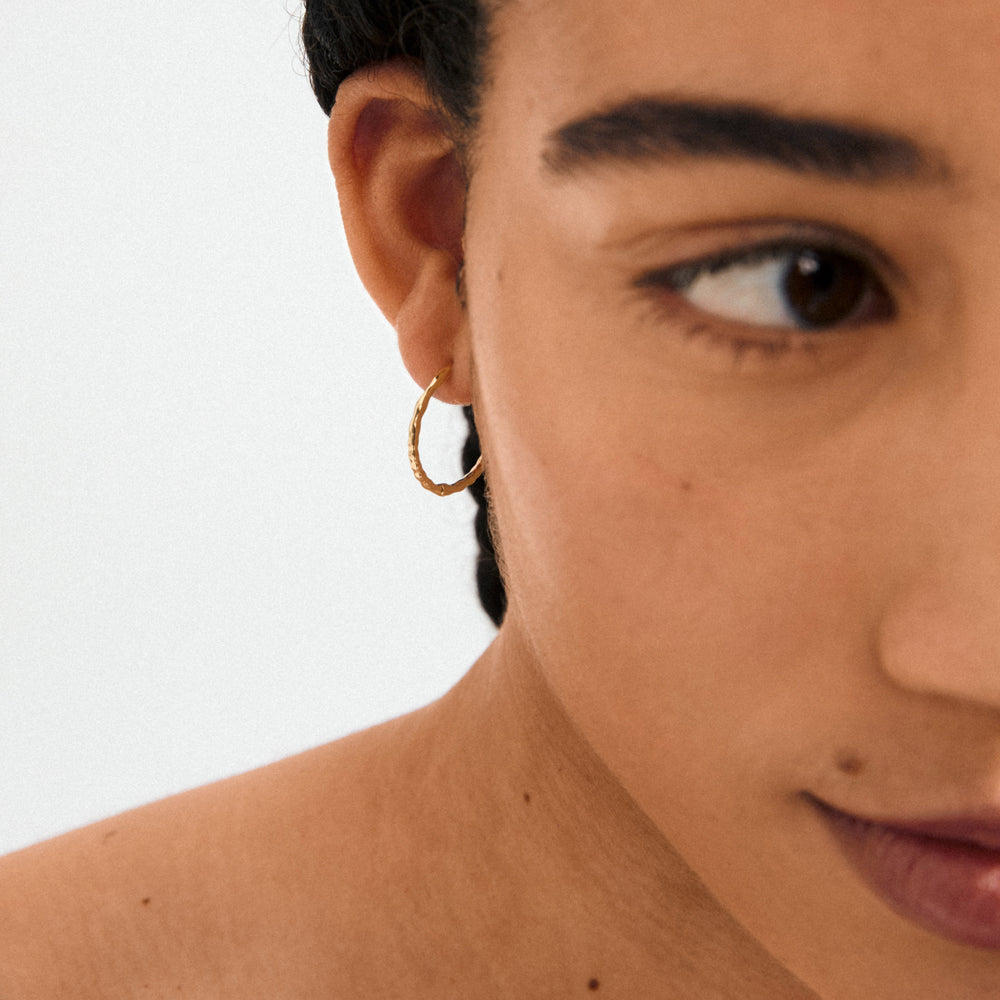 Between Hoop Earrings
