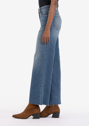 
            
                Load image into Gallery viewer, Kut from the kloth meg fab ab mid indigo wash stretch wide leg jean with raw hem Manitoba Canada
            
        